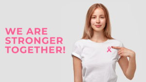 A woman wearing a t-shirt with a pink ribbon( National Breast Cancer Foundation symbol) - 'We are stronger together!'